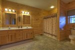 Lower Level Bathroom With a Large Walk-In Shower